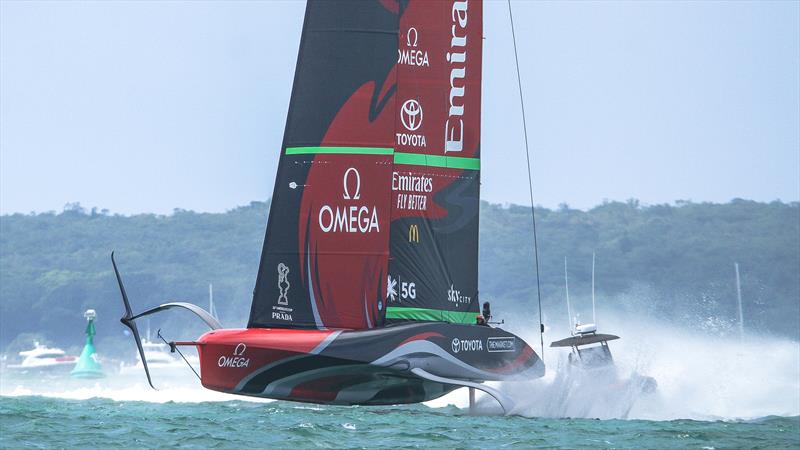 Te Rehutai sprays the umpire boat -  Emirates Team New Zealand - December 18, 2020 - Waitemata Harbour - America's Cup 36 - photo © Richard Gladwell / Sail-World.com