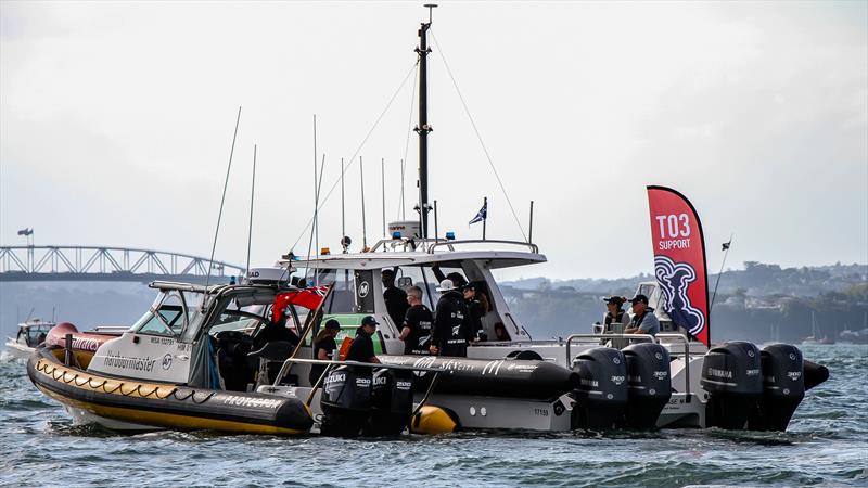 Emirates Team New Zealand chase boat gets stopped by the harbourmaster for exceeding the speed limit - - America's Cup World Series - December 2020 - Waitemata Harbour - America's Cup 36 photo copyright Richard Gladwell / Sail-World.com taken at Royal New Zealand Yacht Squadron and featuring the AC75 class