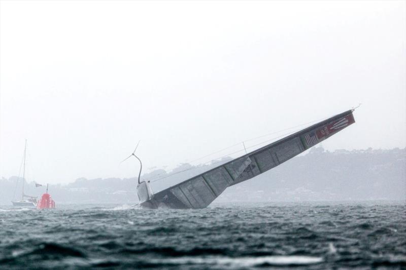 A string squall sends PATRIOT airborne, crashing down, and into an immediate capsize photo copyright Sailing Energy / American Magic taken at  and featuring the AC75 class