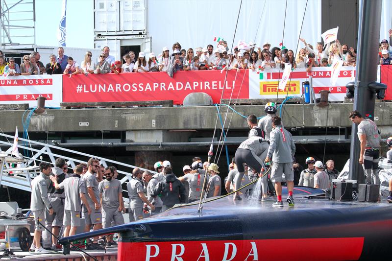 Celebrations start at the Luna Rossa base - Day 2 - Prada Cup Semi-Final - January 30, 2021 - America's Cup 36 photo copyright Richard Gladwell / Sail-World.com taken at Circolo della Vela Sicilia and featuring the AC75 class