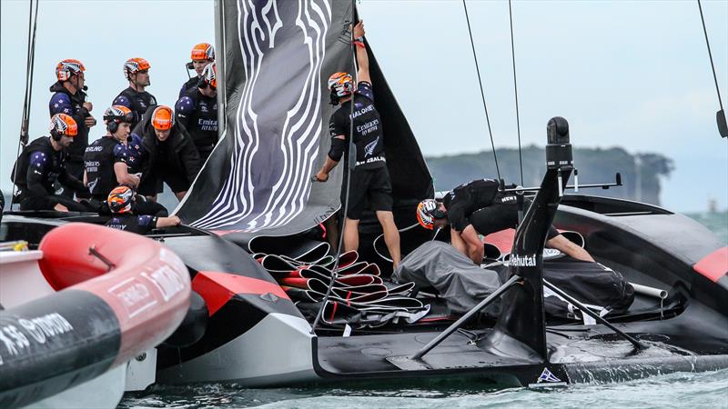 Emirates Team NZ flake their double skinned mainsail - America's Cup - Day 1 - March 10, 2021, Course E - photo © Richard Gladwell / Sail-World.com