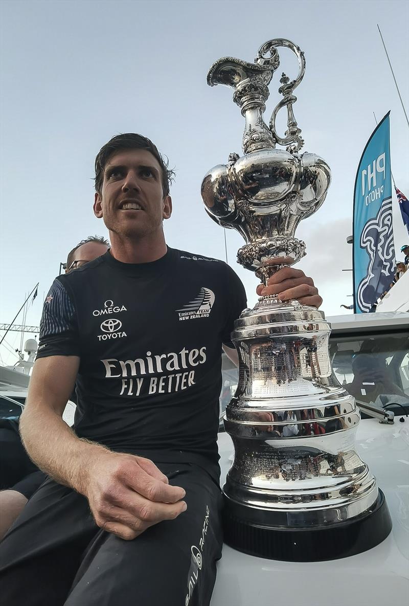 Peter Burling holds the America's Cup - March 17, 2021 photo copyright Richard Gladwell / Sail-World.com taken at Royal New Zealand Yacht Squadron and featuring the AC75 class
