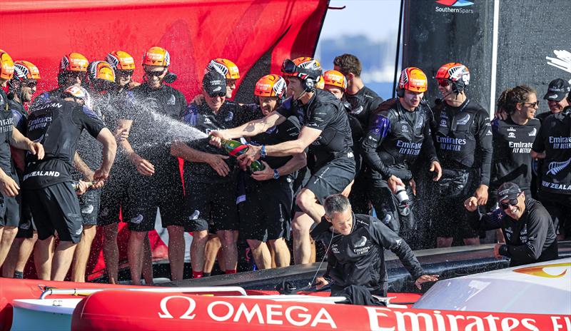 Skipper Peter Burling gives the Emirates Team NZ crew a victory spray just after the final race in the 36th America's Cup photo copyright ACE / Studio Borlenghi taken at Royal New Zealand Yacht Squadron and featuring the AC75 class