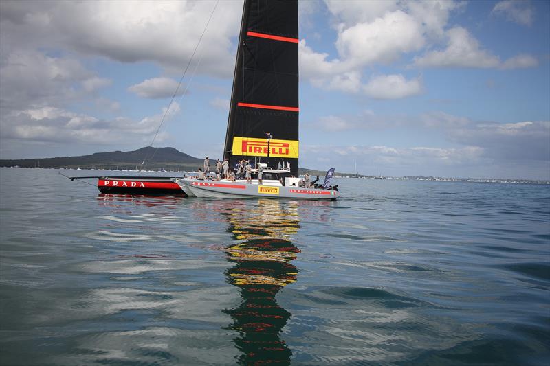 Luna Rossa waits in glassy conditions  - America's Cup - Day 7 - March 17, 2021, Course E photo copyright Richard Gladwell - Sail-World.com/nz taken at Royal New Zealand Yacht Squadron and featuring the AC75 class