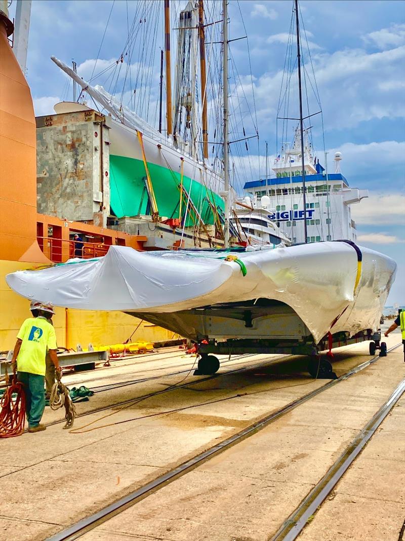 PATRIOT, American Magic's AC75, being craned off the vessel HAPPY DELTA upon returning from New Zealand on Saturday photo copyright American Magic taken at New York Yacht Club and featuring the AC75 class