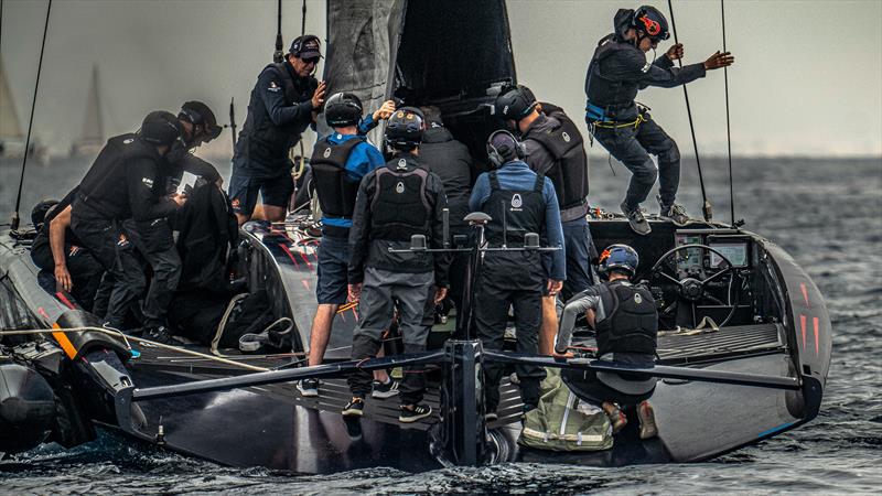 Adjusting boomless mainsail - Alinghi Red Bull Racing - AC75 - October 29, 2022 - Barcelona photo copyright Alex Carabi / America's Cup taken at Société Nautique de Genève and featuring the AC75 class