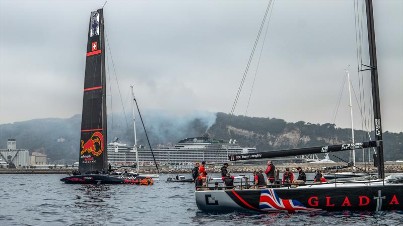 Gladiator - 52 Super Series waits for the wind with  Alinghi Red Bull Racing - AC75 - October 29, 2022 - Barcelona photo copyright Alex Carabi / America's Cup taken at Société Nautique de Genève and featuring the AC75 class