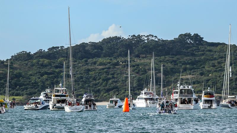 Part of the spectator fleet parked to windward of the top mark and in the lee of Motuihe Island - America's Cup - Day 5 - March 15, 2021, Course E - photo © Richard Gladwell / Sail-World.com/nz
