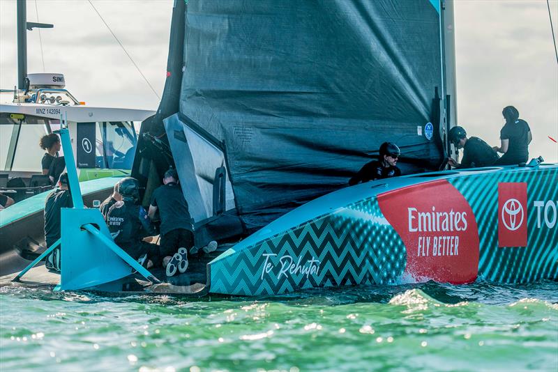 Support crew work inside Emirates Team NZ's double skinned mainsail - AC75 - Day 11 - April 14, 2023 - photo © Adam Mustill / America's Cup