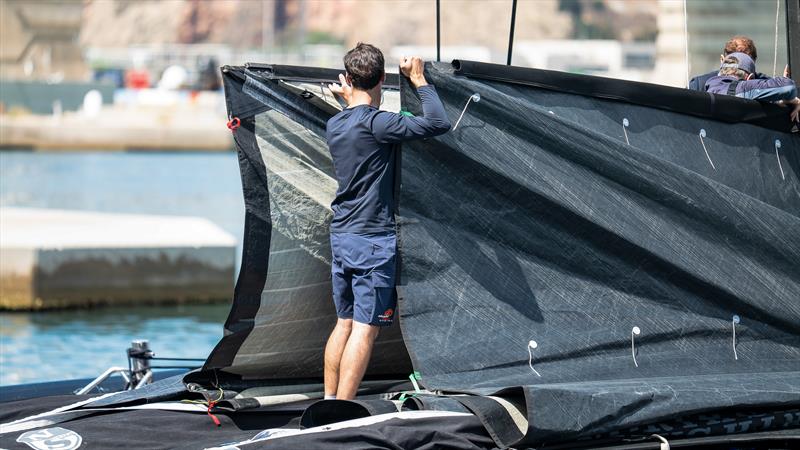 Sorting the mainsail head -  Alinghi Red Bull Racing - AC75  - Day 62 - May 16, 2023 - Barcelona - photo © Job Vermuelen / America's Cup