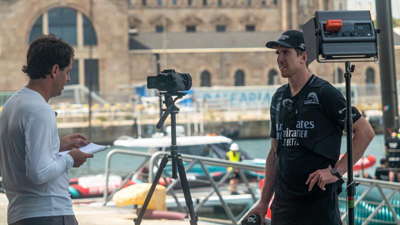 Peter Burling is interviewed by a member of the AC37 Joint Recon Team - Emirates Team New Zealand - AC75  - Day 24 - July 19, 2023 - Barcelona photo copyright Job Vermeulen / America's Cup taken at Royal New Zealand Yacht Squadron and featuring the AC75 class