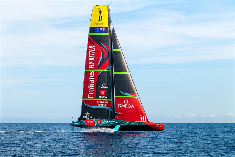Shot from leeward of Emirates Team New Zealand up and foiling across the breeze showing the hull endplate between the surface and the rig  - AC75 - Day 42 - Barcelona - October 3, 2023 - photo © Ugo Fonolla / America's Cup