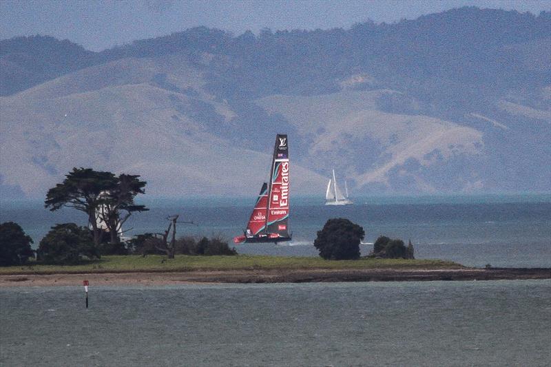 Emirates Team New Zealand behind the spit on Browns Island - AC75, Day 8 - March 30, 2026 - photo © Richard Gladwell / Sail-World.com/nz