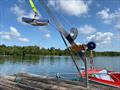 A winch-operated hoist on a jetty, for lifting wheelchair users into a dinghy © Magnus Smith