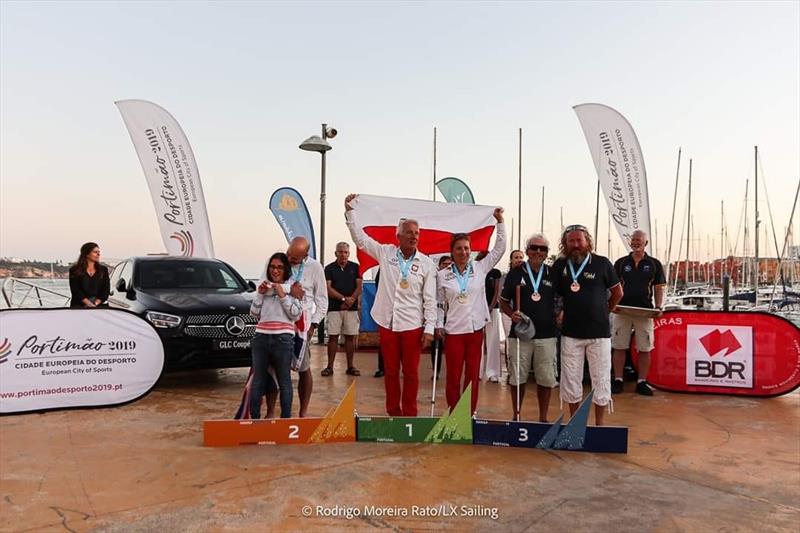 Natalie and Alan in the 303 prize giving during the Hansa Europeans at Portimão, Portugal photo copyright Rodrigo Moreira Rato / LX Sailing taken at  and featuring the Hansa class