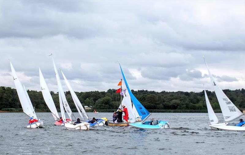 David Durston and Paul Philliips lead the Liberty fleet during the Hansa TT at Frensham photo copyright Tony Machen taken at Frensham Pond Sailing Club and featuring the Hansa class