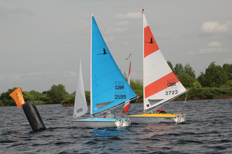Libertys at the mark during the Notts County Hansa TT photo copyright Graham Stamper taken at Notts County Sailing Club and featuring the Hansa class