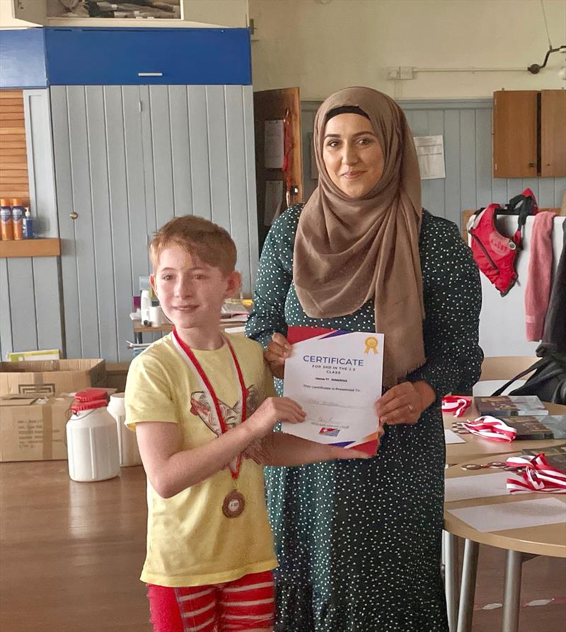 Birmingham Hansa TT - Max Byrne 3rd in the 2.3 Class presented by Cllr Miriam Kahn photo copyright Phil Reeves taken at Midland Sailing Club and featuring the Hansa class