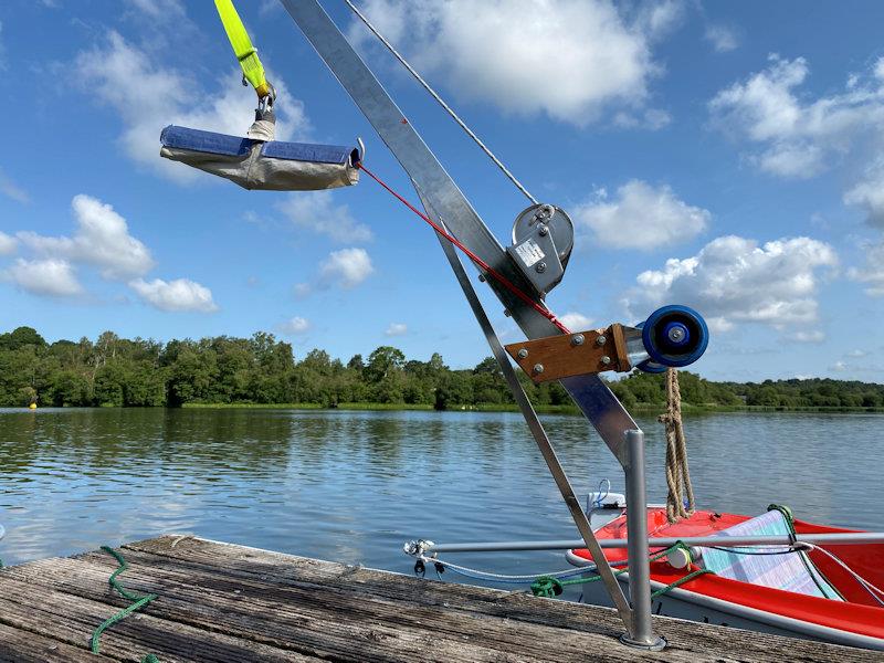 A winch-operated hoist on a jetty, for lifting wheelchair users into a dinghy - photo © Magnus Smith