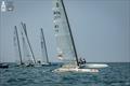 Kuba Surowiec POL 41 and Lamberto Cesare ITA 13 split up the beat - A-Class Cat European Championships at Riccione Day 3 © Gordon Upton / www.guppypix.com