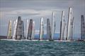 PredictWind A-Class Cat Worlds 2025 - The Classic fleet well behaved at the start on Castor Bay