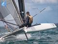 Aussie Classic sailor Ewan Campbell demonstrating the perfect downwind 'Wild Thing' technique.- Day 5 Predictwind A-Class Catamaran World Championships - Milford, NZ - November 15, 2025