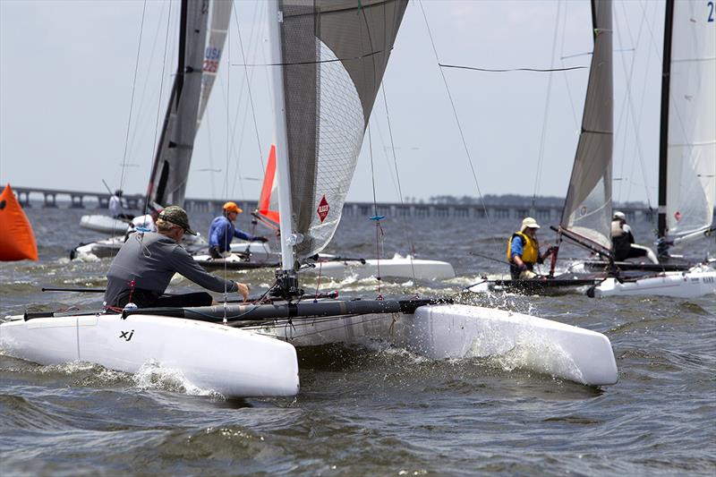 Racing on day 3 of the A Class Catamaran North American Championship photo copyright Richard Langdon / www.oceanimages.co.uk taken at SailNC and featuring the A Class Catamaran class