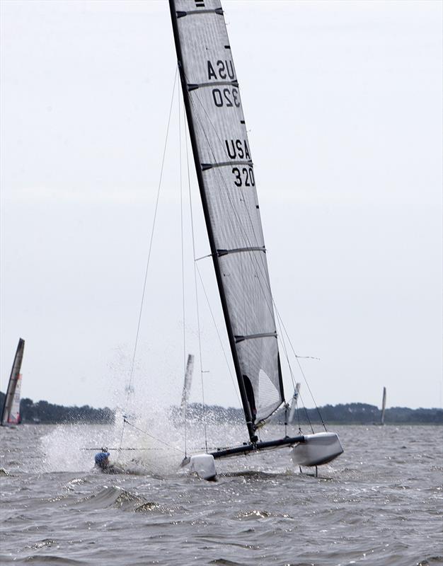 Racing on day 4 of the A Class Catamaran North American Championship photo copyright Richard Langdon / www.oceanimages.co.uk taken at SailNC and featuring the A Class Catamaran class