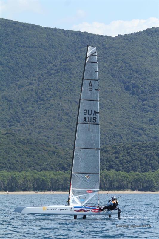 Glenn Ashby successfully foiling in marginal conditions on day 1 of the A Class Cat Worlds at Punta Ala photo copyright Gordon Upton taken at Centro Velico Punta Ala and featuring the A Class Catamaran class