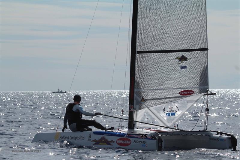 Even Ashby has to go into low drag mode occasionally on day 2 of the A Class Cat Worlds at Punta Ala photo copyright Gordon Upton taken at Centro Velico Punta Ala and featuring the A Class Catamaran class