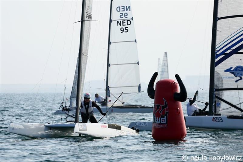 Former multiple World Champion, Stevie Brewin, rounding the bottom mark on day 1 of the A Class Cat Worlds at the WPNSA - photo © Paula Kopylowicz