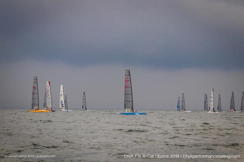 Running before the storm - the fleet ordered to head home -  on day 3 of the A Class Catamaran European Championships in Warnemunde photo copyright Gordon Upton / www.guppypix.com taken at  and featuring the A Class Catamaran class