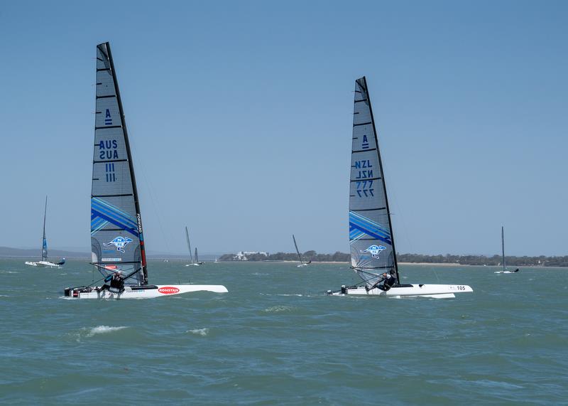 Emirates Team New Zealand's Glenn Ashby trails Blair Tuke  in the A-Class Catamaran World Championships in Hervey Bay, Queensland, Australia. - photo © Josh McCormack