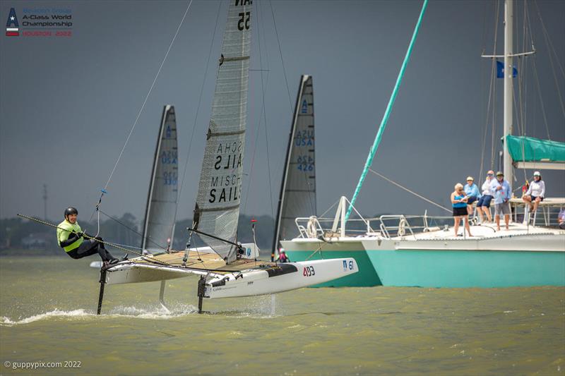 Andrew Woods CAN 55 looks delighted to have finished alive - Day 1 of the Beacon Group A-Class Catamaran World Championships in Texas photo copyright Gordon Upton / www.guppypix.com taken at Houston Yacht Club and featuring the A Class Catamaran class