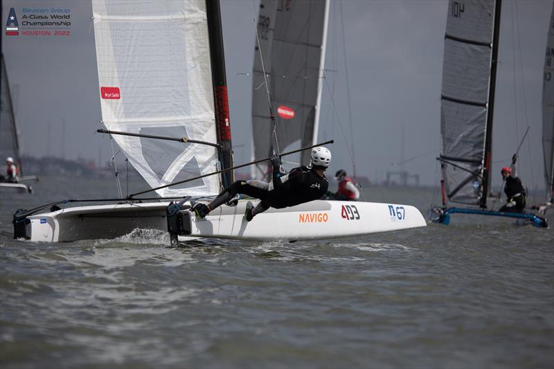 Kuba Surowiec POL 41 making his astounding race winning foiling move at the first lap top mark - Day 1 of the Beacon Group A-Class Catamaran World Championships in Texas photo copyright Gordon Upton / www.guppypix.com taken at Houston Yacht Club and featuring the A Class Catamaran class