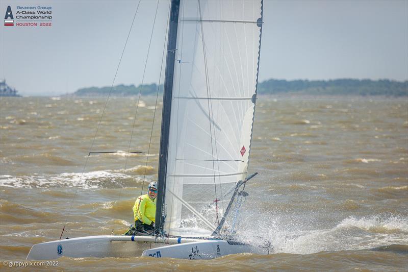 Ken Marshack USA 192 finishes the first race in the short bay chop on day 3 of the Beacon Group A-Class Catamaran World Championships in Texas photo copyright Gordon Upton / www.guppypix.com taken at Houston Yacht Club and featuring the A Class Catamaran class