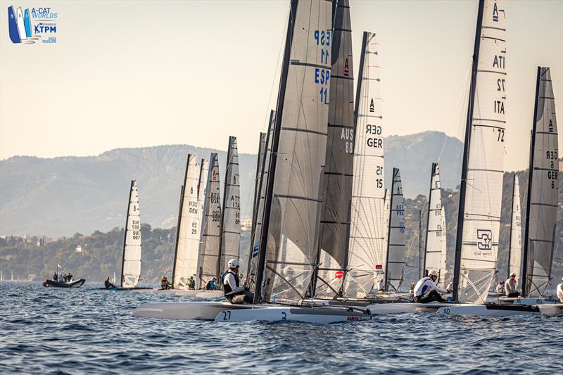 A-Cat Worlds at Toulon, France Day 1 - The start of the Open foiling fleet. Note they are not foiling. Minimum conditions led to the race being canned at the top mark - photo © Gordon Upton / www.guppypix.com