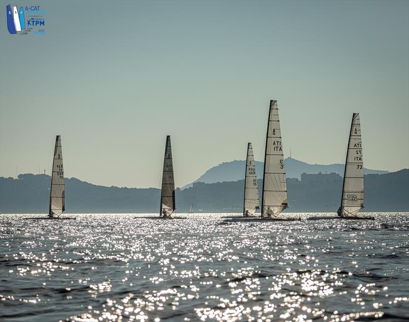 A-Cat Worlds at Toulon, France Day 1 - The Open fleet are not happy when in displacement mode.  Their larger foils and winglets and flatter sails really work against them in minimal conditions - photo © Gordon Upton / www.guppypix.com