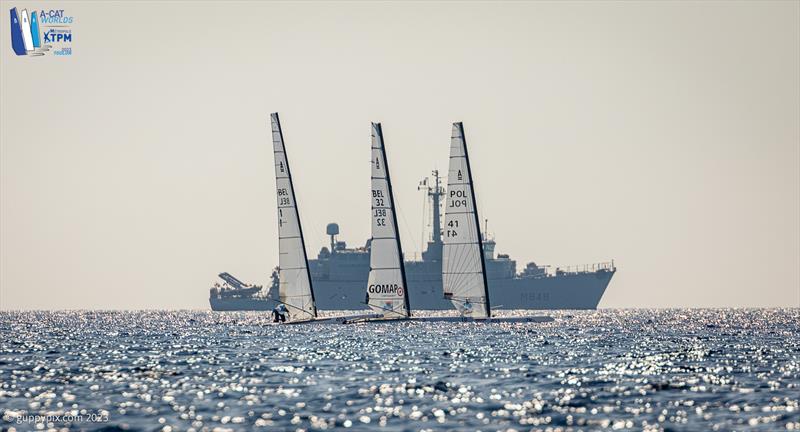 A-Cat Worlds at Toulon, France Day 2 - The Croix Du Sud Minesweeper gatecrashes the party on it's way back home - photo © Gordon Upton / www.guppypix.com