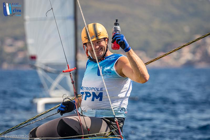 A-Cat Worlds at Toulon, France Day 2 - Misha Heemskerk happy with his first win photo copyright Gordon Upton / www.guppypix.com taken at Yacht Club de Toulon and featuring the A Class Catamaran class