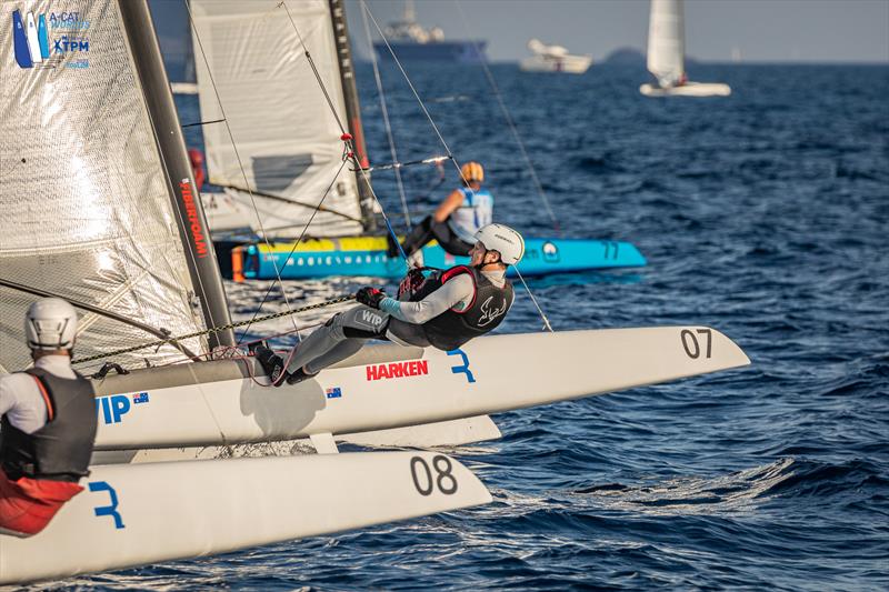 A-Cat Worlds at Toulon, France Day 3 - The second race start. Misha Heemskerk Bow77, Stevie Brewin 07 and Darren Bundock 08 all start at the committee boat intending to tack off right photo copyright Gordon Upton / www.guppypix.com taken at Yacht Club de Toulon and featuring the A Class Catamaran class