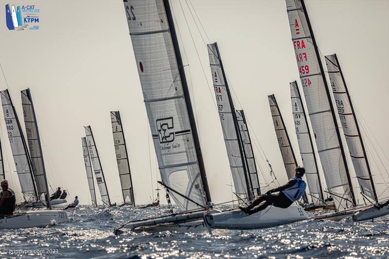 A-Cat Worlds at Toulon, France Day 4 - the Classic race gets off into champagne conditions for many photo copyright Gordon Upton / www.guppypix.com taken at Yacht Club de Toulon and featuring the A Class Catamaran class