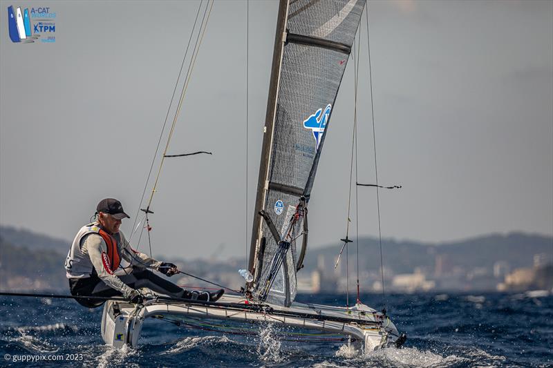 A-Cat Worlds at Toulon, France Day 4 - Gustave Doreste ESP 72 is sailing a solid race, the European Champion looks at home in these conditions just as well as the light stuff photo copyright Gordon Upton / www.guppypix.com taken at Yacht Club de Toulon and featuring the A Class Catamaran class