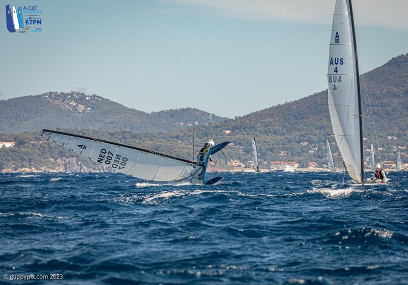 A-Cat Worlds at Toulon, France Day 6 - Maybe the moment Mischa Heemskerk NED loses the Championship?  This bottom mark capsize allowed Kuba Surowiec POL to catch up following his similar incident at the top of the course - photo © Gordon Upton / www.guppypix.com