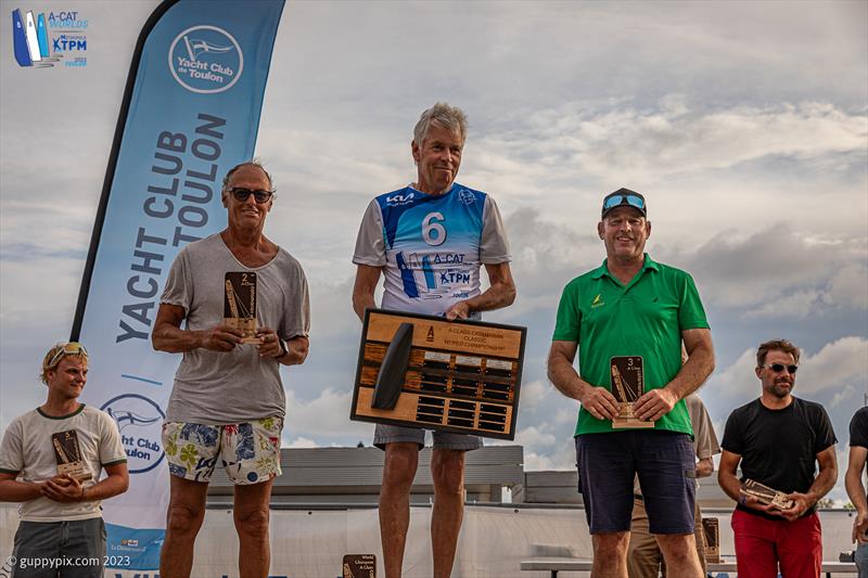 A-Cat Worlds at Toulon, France Day 6 - The Classic Fleet Podium: Scott Anderson AUS, Gustavo Doreste ESP, Andrew Landenberger AUS photo copyright Gordon Upton / www.guppypix.com taken at Yacht Club de Toulon and featuring the A Class Catamaran class