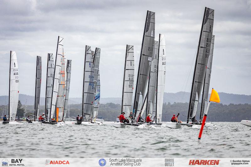 Australian A-Cat Nationals on Lake Macquarie Day 2 - The Classic Fleet starts photo copyright Gordon Upton / www.guppypix.com taken at South Lake Macquarie Amateur Sailing Club and featuring the A Class Catamaran class