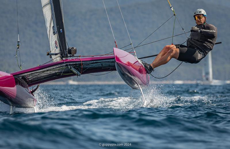 A Class Cat Regata Nazionale - Team DNA fast pacemaker Thjis Visser is the sailing partner for Mischa in his testing photo copyright Gordon Upton / www.guppypix.com taken at Centro Velico Punta Ala and featuring the A Class Catamaran class