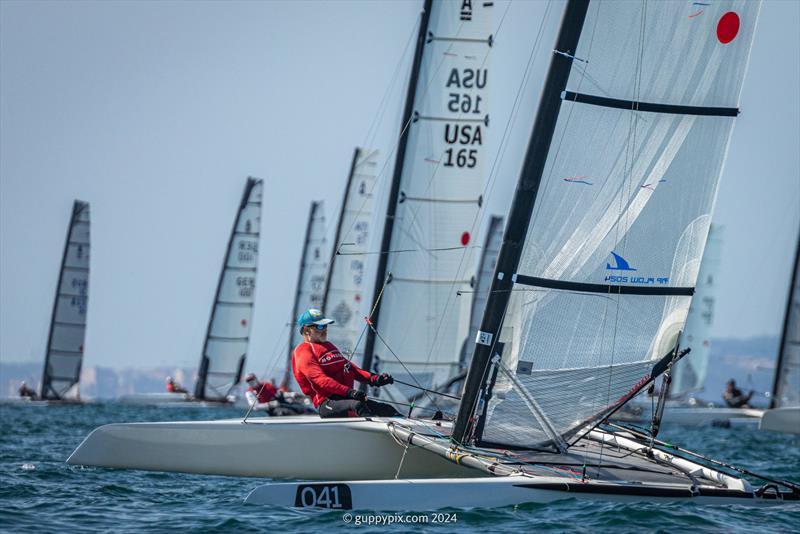 Georg Reutter, GER, a south German lake sailor, needs a very careful eye on him if the wind goes lighter photo copyright Gordon Upton / www.guppypix.com taken at  and featuring the A Class Catamaran class