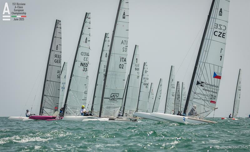 The open fleets gets going into the left over swell from the Croatian winds across the Adriatic on A-Class Cat European Championships at Riccione Day 2 - photo © Gordon Upton / www.guppypix.com