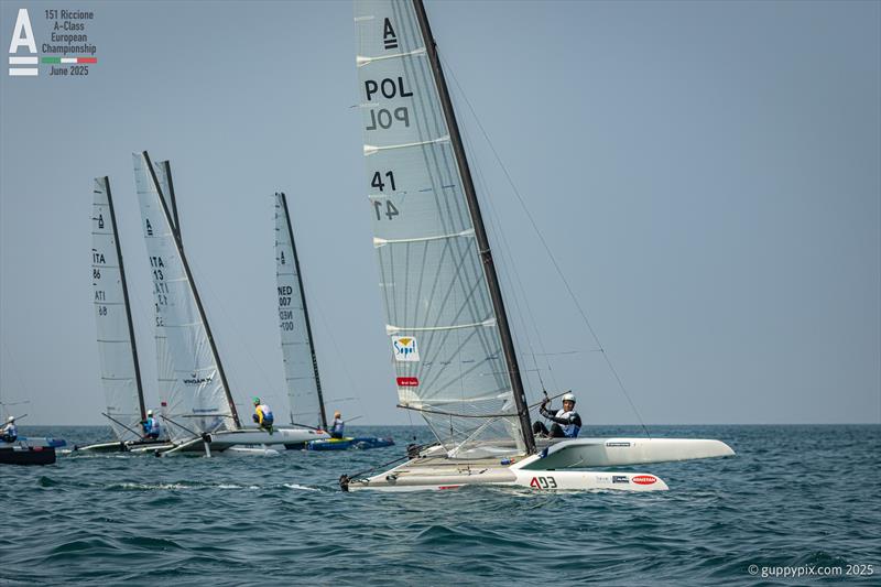 Kuba Surowiec POL 41 and Lamberto Cesare ITA 13 split up the beat - A-Class Cat European Championships at Riccione Day 3 photo copyright Gordon Upton / www.guppypix.com taken at 151 Riccione  and featuring the A Class Catamaran class